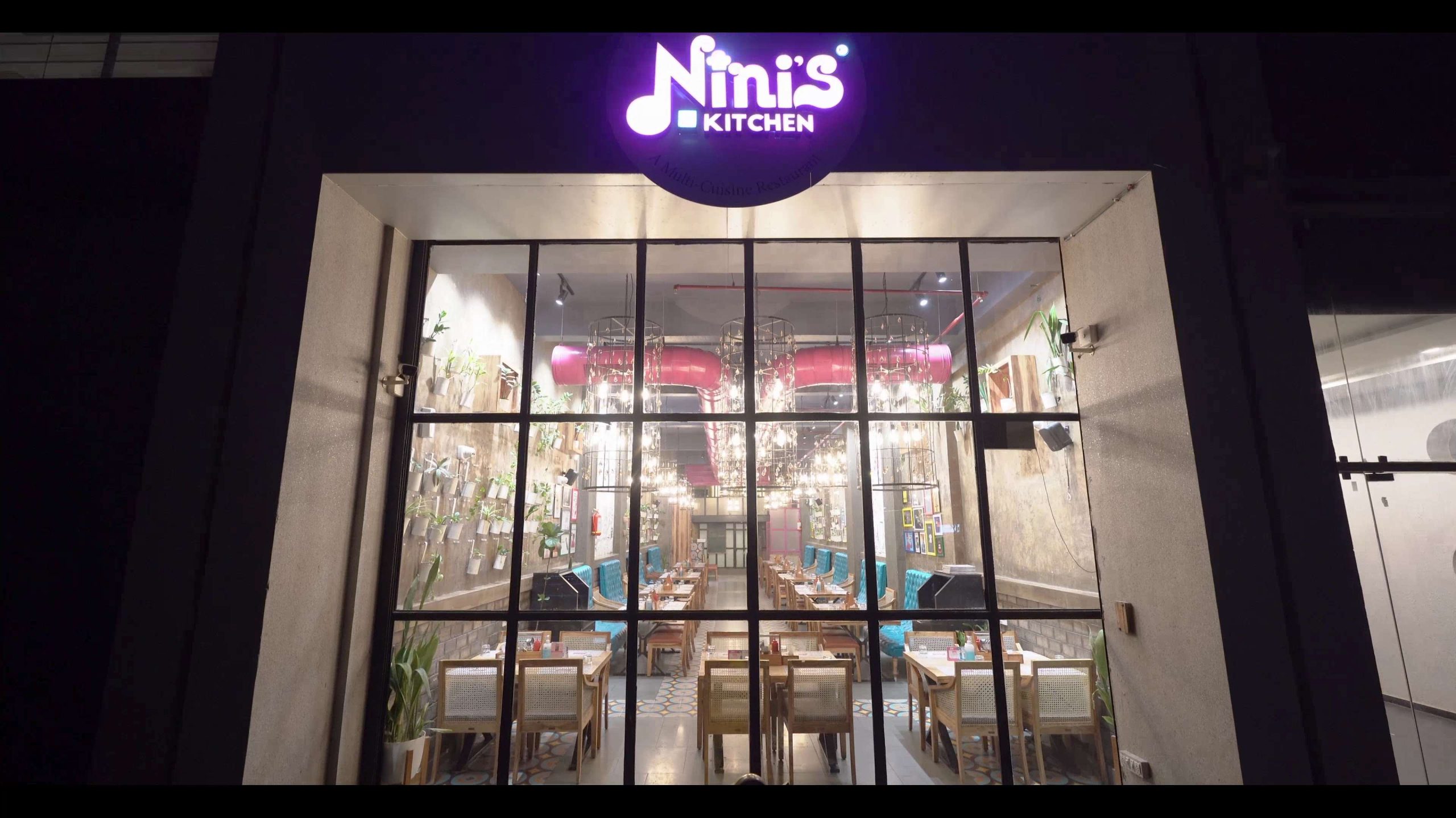 Represents the exterior and ambiance of Nini’s Kitchen